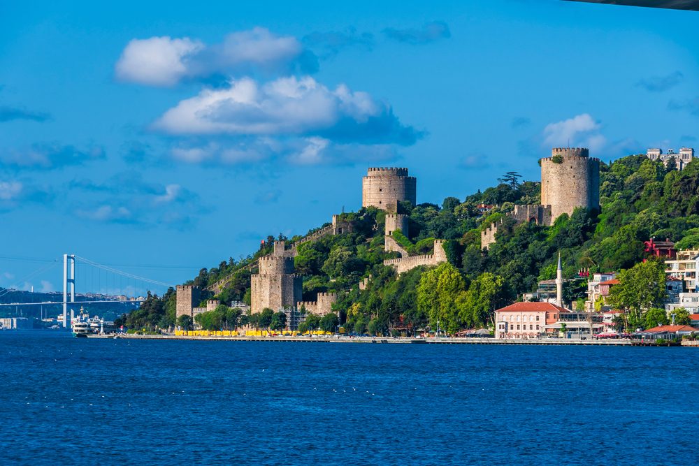 Ships and ferries passing below Rumeli Fortress on the Bosphorus strait